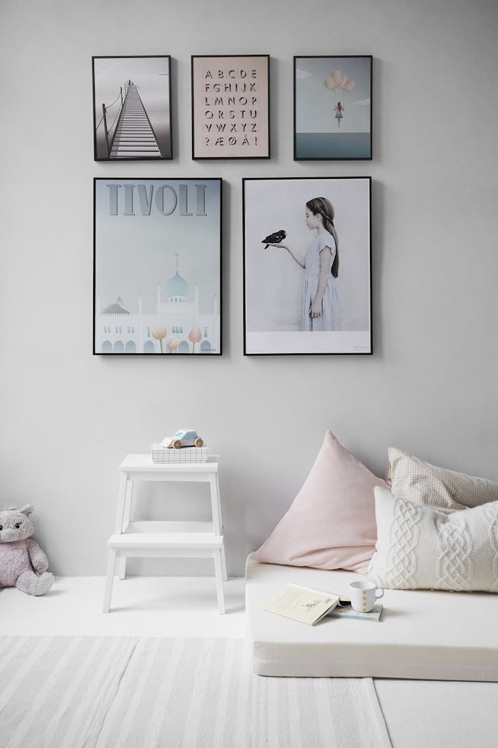 gallery-3 Minimalist Scandinavian bedroom with wall art and cozy decor elements.